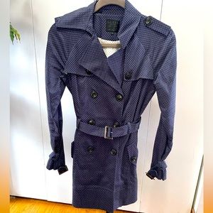 Guess trench coat. Not waterproof. Worn a few times.